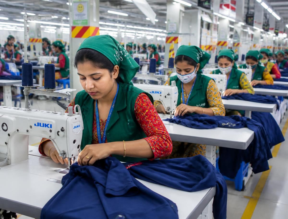 Machine operators sewing garments in a compliant Bangladeshi factory
